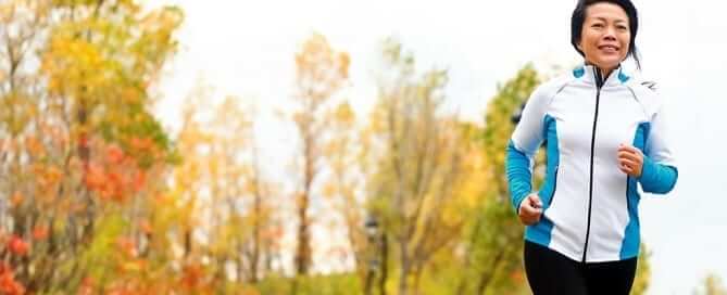 Woman on a morning run in the fall