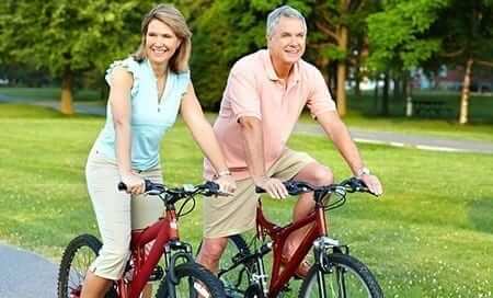 Senior Couple Cycling