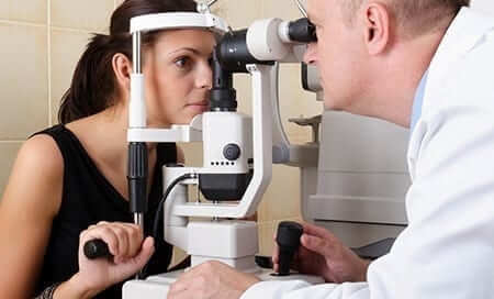 Diabetic woman having her eyes checked