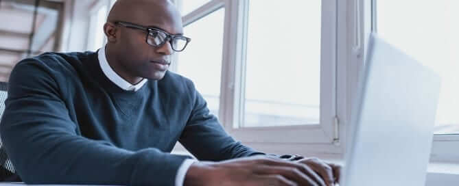 Man looking at laptop