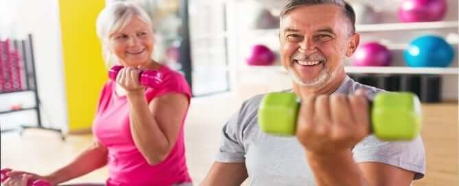 Elderly people exercising together