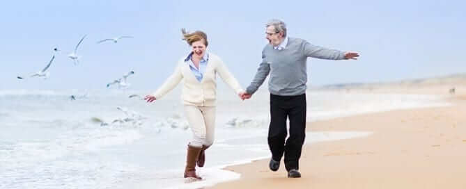 Couple running on the beach